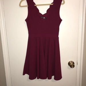A boohoo maroon scalloped cut dress